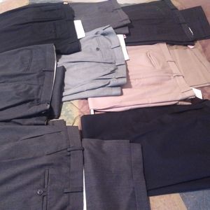 8 Pairs of Pleated Cuffed Dress Pants. 42/32